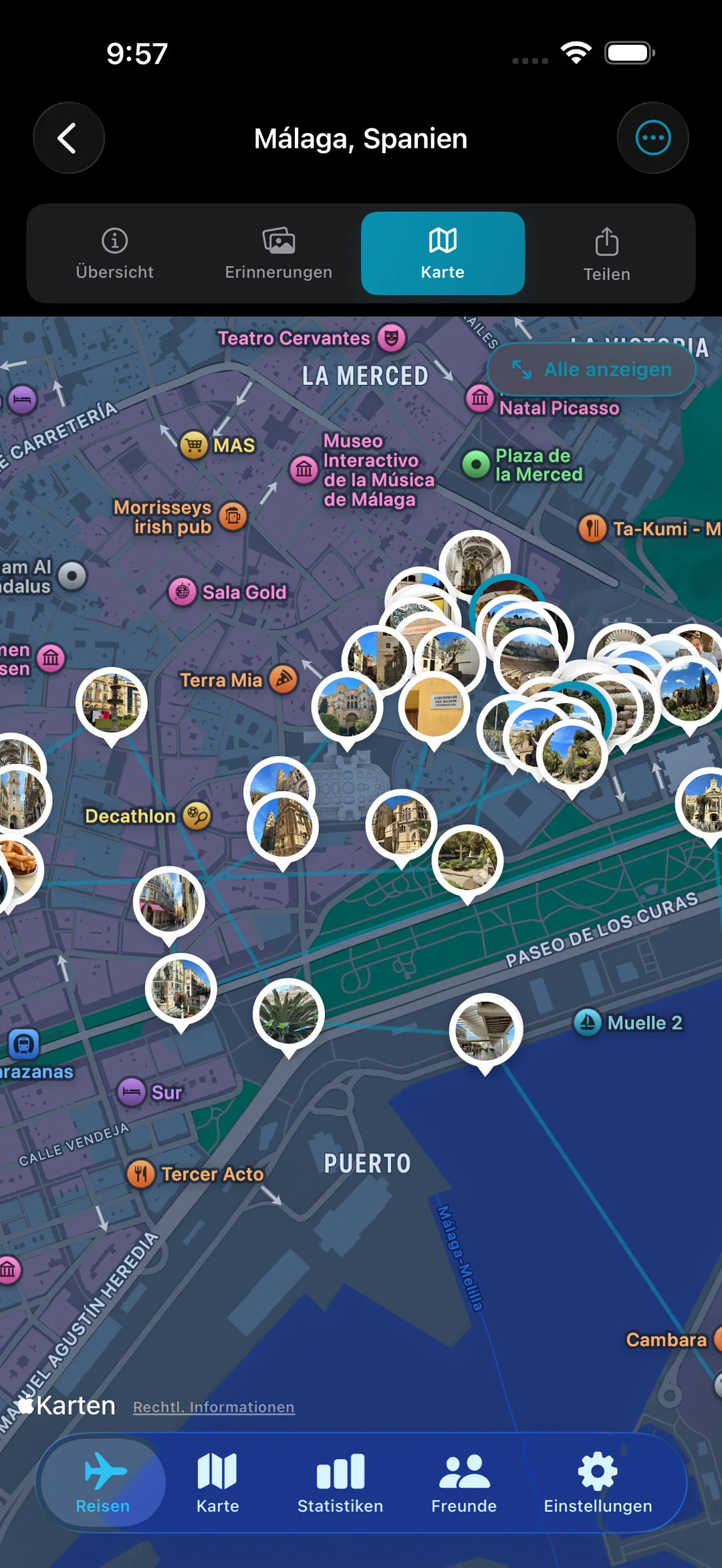 Reisekarte für Málaga mit Foto-Memory-Pins entlang der Straßen, die Sie entlang gegangen sind